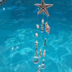 Bola Armonizadora Con una bonita estrella de mar de Zamak y conchas verdaderas ¡Una auténtica maravilla para los amantes del mar!