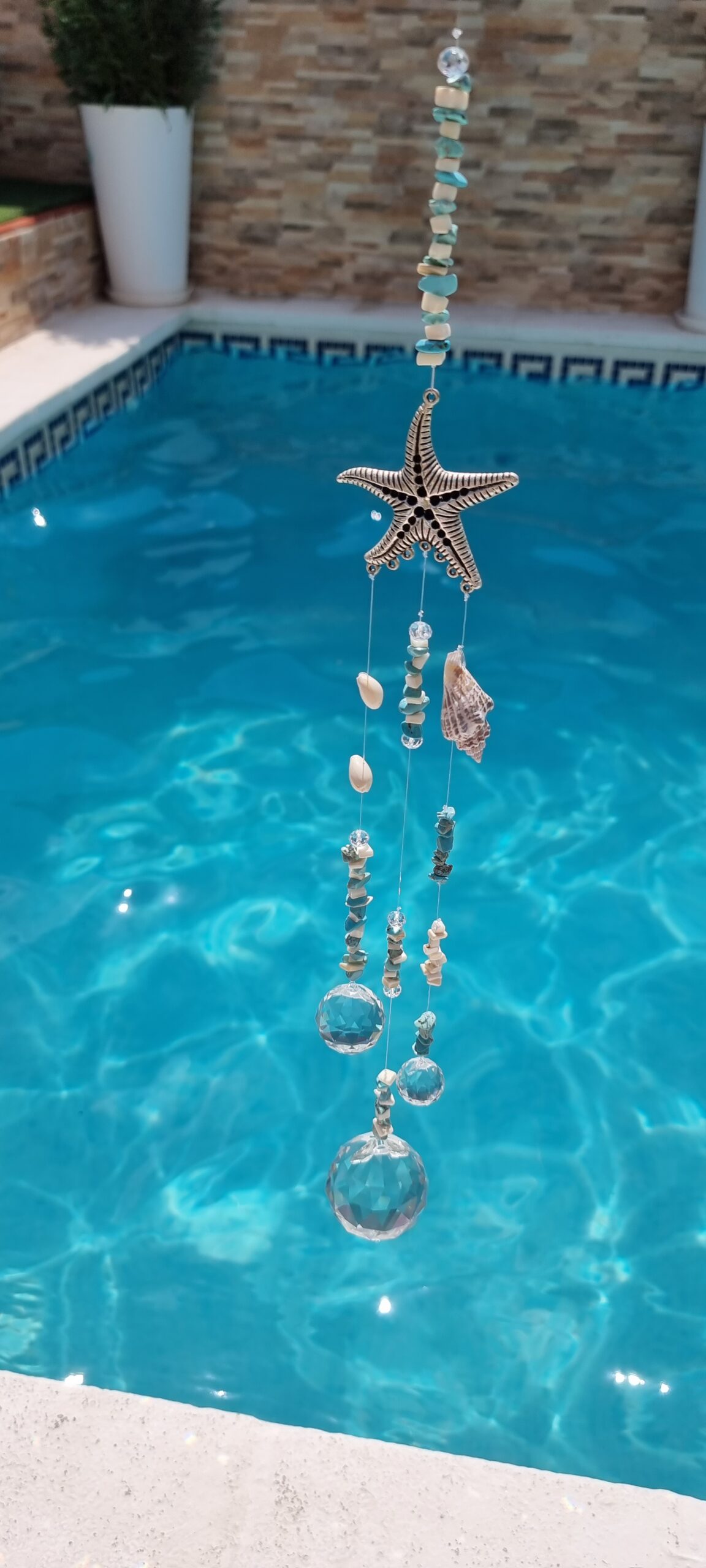 Bola Armonizadora Con una bonita estrella de mar de Zamak y conchas verdaderas ¡Una auténtica maravilla para los amantes del mar!
