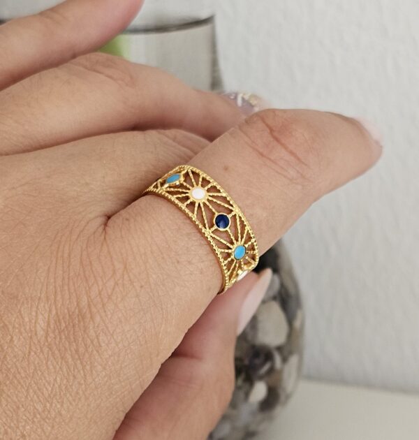 Anillo Circulos Dorado. Además es ajustable. Acero con Baño