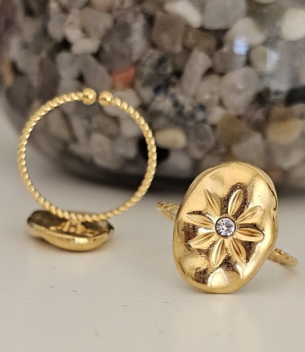 Anillo Flor Circonita Blanca Dorado en acero ajustable